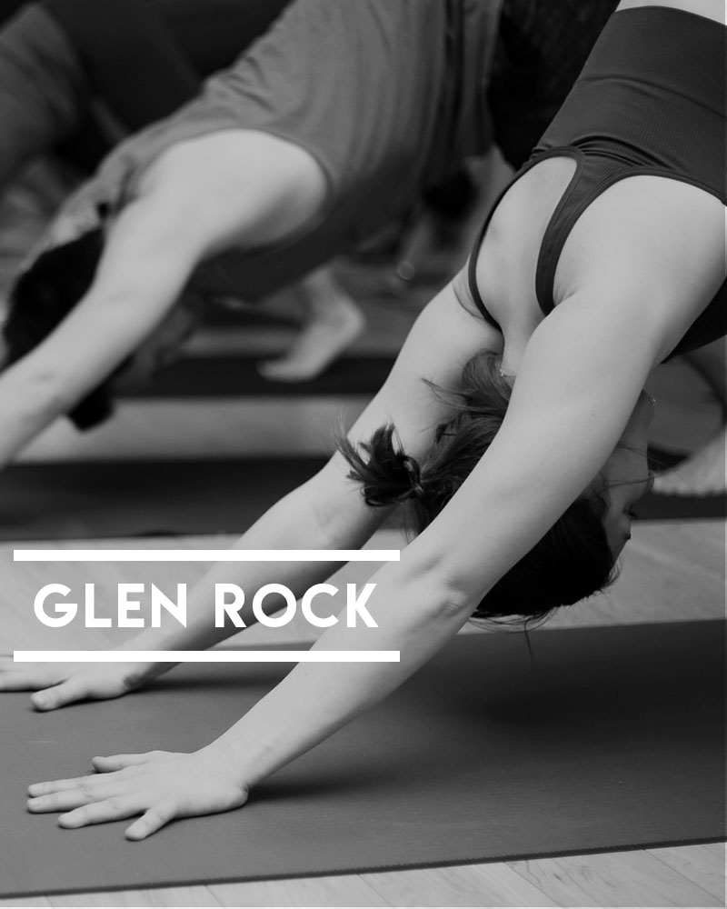 Powerflow Yoga Glen Rock students working out in a hot yoga class.